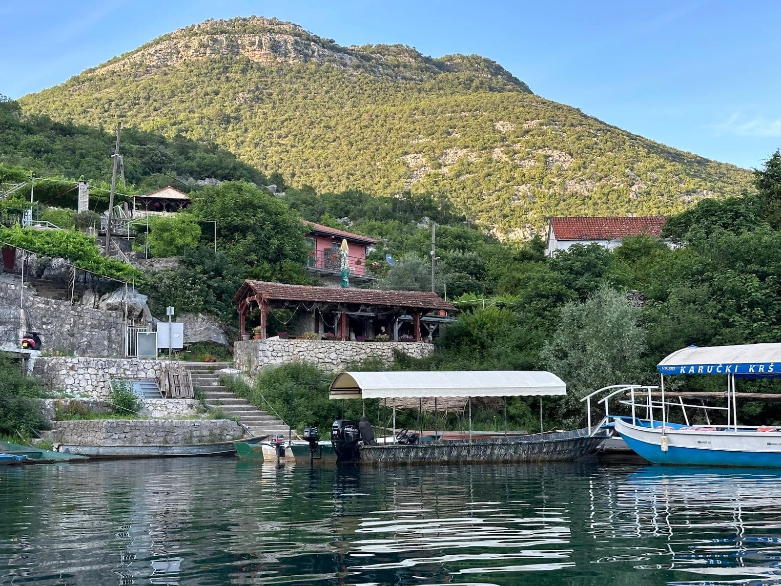 Traditional fishing boats moored at Karuc village harbor